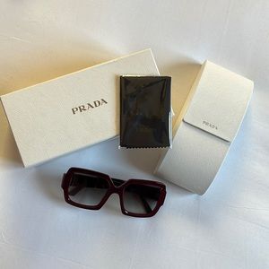 PRADA sunglasses.